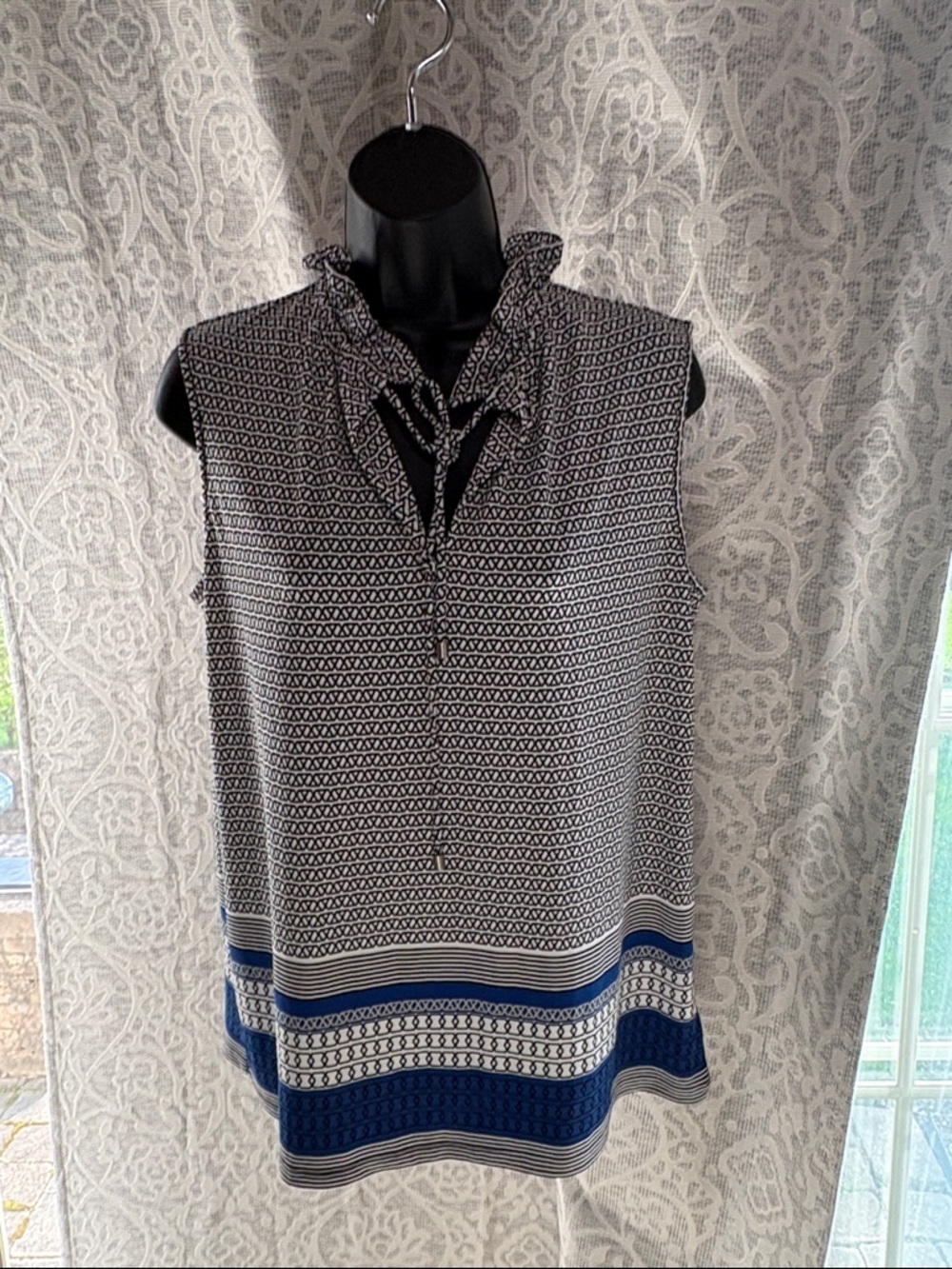 The Limited Collection small  Black/White Geometric Top with Blue Border